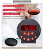 A person sleeping in bed with an alarm clock and a bed shaker. Náhľad obrázku produktu