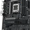 A close-up, angled view of a black ASUS motherboard with silver accents, showcasing the CPU socket, RAM slots, and an M.2 heatsink. Produktbild-Vorschau