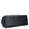 The bottom view of a black duffel bag against a white background. Produktbild-Vorschau