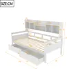 A white daybed with drawers and a bookshelf headboard, shown with dimensions indicated by yellow lines and numbers. Voir les images du produit