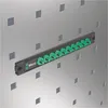 A Wera socket holder with green twist-to-lock sockets is mounted on a perforated metal panel. Produktbild-Vorschau