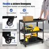 A person is pushing a black three-tier tool cart filled with tools and a box. The cart has wheels and a handle. There are diagrams on the left side of the image illustrating the wheels and their features. Náhled obrázku produktu