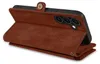 A brown leather wallet-style phone case is shown from the back with the phone inside. Produktbild-Vorschau