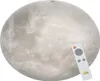 A ceiling light fixture designed to look like the moon, with a remote control placed on it. Náhled obrázku produktu