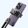 A close-up shot of a smartphone attached to a selfie stick/tripod mount. Anteprima dell’immagine prodotto