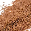 A close-up, overhead view of a pile of brown, granular streusel topping. Produktbild-Vorschau