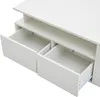 A close-up view of the open drawers of a white modern coffee table. Produktbild-Vorschau