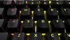 A close-up view of a black mechanical keyboard with illuminated keys. Anteprima dell’immagine prodotto