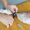 Pince à sceller les saucisses + 60 agrafes Voir les images du produit 2