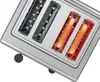 A close-up view of a four-slot toaster, with two slots glowing red and orange, indicating they are heating. Anteprima dell’immagine prodotto