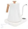 A white electric gooseneck kettle with a wooden handle and lid sits on its charging base. Náhľad obrázku produktu