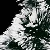 A close-up view of a section of a Christmas tree with white fiber optic tips and a small LED light. Produktbild-Vorschau