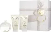 A gift set containing a perfume bottle and two body lotion tubes, presented with a decorative gift box. Náhled obrázku produktu
