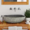 A stone sink on a wooden vanity with a mirror above. Podgląd zdjęcia produktu