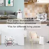 A collage of four images showing a white modular shelving unit in different settings: a living room, a kitchen, a bathroom, and a room with an armchair. Text overlays provide product information in German and English. Produktbild-Vorschau