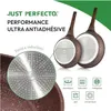Close-up view of the bottom of two frying pans, with a detailed illustration of the induction base of one pan. Icons indicating compatibility with different heat sources are also shown. Produktbild-Vorschau