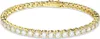 A close-up studio shot of a gold tennis bracelet with clear stones. Anteprima dell’immagine prodotto