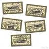 Several camouflage-patterned tags with text messages are arranged on a white background. Voir les images du produit