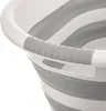 Close-up of the handle and upper rim of a collapsible laundry basket. Produktbild-Vorschau