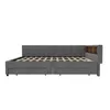 A grey upholstered daybed with wooden accents on the headboard, shown from the side. Produktbild-Vorschau