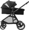 A black Maxi-Cosi Zelia 3 stroller with a bassinet attachment, shown from the side against a white background. Produktbild-Vorschau
