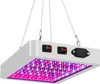 A white LED grow light with pink and blue LEDs, suspended by wires, against a white background. Podgląd zdjęcia produktu