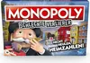 The image shows the front of a Monopoly board game box titled 'Monopoly für schlechte Verlierer' (Monopoly for bad losers). A cartoon character, Mr. Monopoly, is depicted crying and wiping his eyes with money, with a street scene in the background. Text on Náhľad obrázku produktu