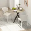 A dining set with two chairs and a round table in a room. Produktbild-Vorschau