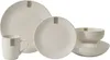 A collection of white ceramic tableware, including plates, bowls, and a mug, arranged on a white background. Voir les images du produit