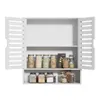 A white wall-mounted cabinet with two doors and adjustable shelves, filled with various jars of food items. Podgląd zdjęcia produktu