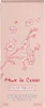 A pink box with cherry blossom illustrations and product details. Náhled obrázku produktu