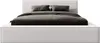 A white upholstered bed with gray bedding and pillows, presented against a white background. Produktbild-Vorschau