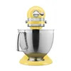 A yellow KitchenAid stand mixer with a silver bowl is shown against a white background. Produktbild-Vorschau
