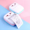 Two mini printers with cute cat faces are shown on a pink and blue background. One printer is printing a drawing of a girl. Produktbild-Vorschau