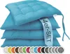 A stack of four turquoise seat cushions with a label indicating '4er-SET'. Below the cushions, a row of circular color swatches is displayed. Produktbild-Vorschau