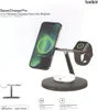 A Belkin BoostCharge Pro 3-in-1 Wireless Charging Stand with MagSafe is shown with an iPhone, Apple Watch, and AirPods Pro charging. Podgląd zdjęcia produktu
