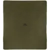 A flat lay of an olive green wool blanket with a medical symbol and 'US' printed in the center. Produktbild-Vorschau