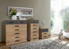 A bedroom scene with two dressers and a nightstand. Produktbild-Vorschau
