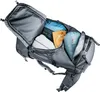 An open backpack with various items packed inside. Produktbild-Vorschau