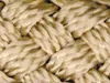 A close-up, detailed view of a woven hay net for horses. Produktbild-Vorschau