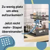 A kitchen counter with a two-tier metal organizer holding spice jars and bottles, with text overlay. Produktbild-Vorschau