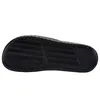 The sole of a black Nike slide sandal is shown against a white background. Anteprima dell’immagine prodotto