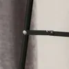 A close-up view of a black metal frame with a rivet connection. Podgląd zdjęcia produktu