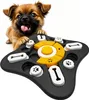 A puppy is playing with a dog puzzle toy. Podgląd zdjęcia produktu