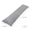 A long, gray pillow with white star patterns is shown diagonally against a white background. Dimensions are indicated with dashed lines and text. Produktbild-Vorschau