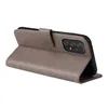 A gray flip case for a smartphone is shown open, revealing the phone's camera array. The case has a textured finish and a floral pattern embossed on the front flap. Produktbild-Vorschau