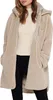 A woman wearing a beige sherpa jacket and a cream-colored turtleneck. Produktbild-Vorschau