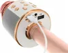 A close-up view of the ports and buttons on a white and rose gold karaoke microphone. Produktbild-Vorschau