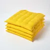 HOMESCAPES Set de 4 coussins de chaise 40x40 cm jaune - Voir les images du produit 1