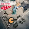 A woman is sitting on the floor next to a disassembled rowing machine, reading a manual. Various parts of the rowing machine are scattered around her. Produktbild-Vorschau